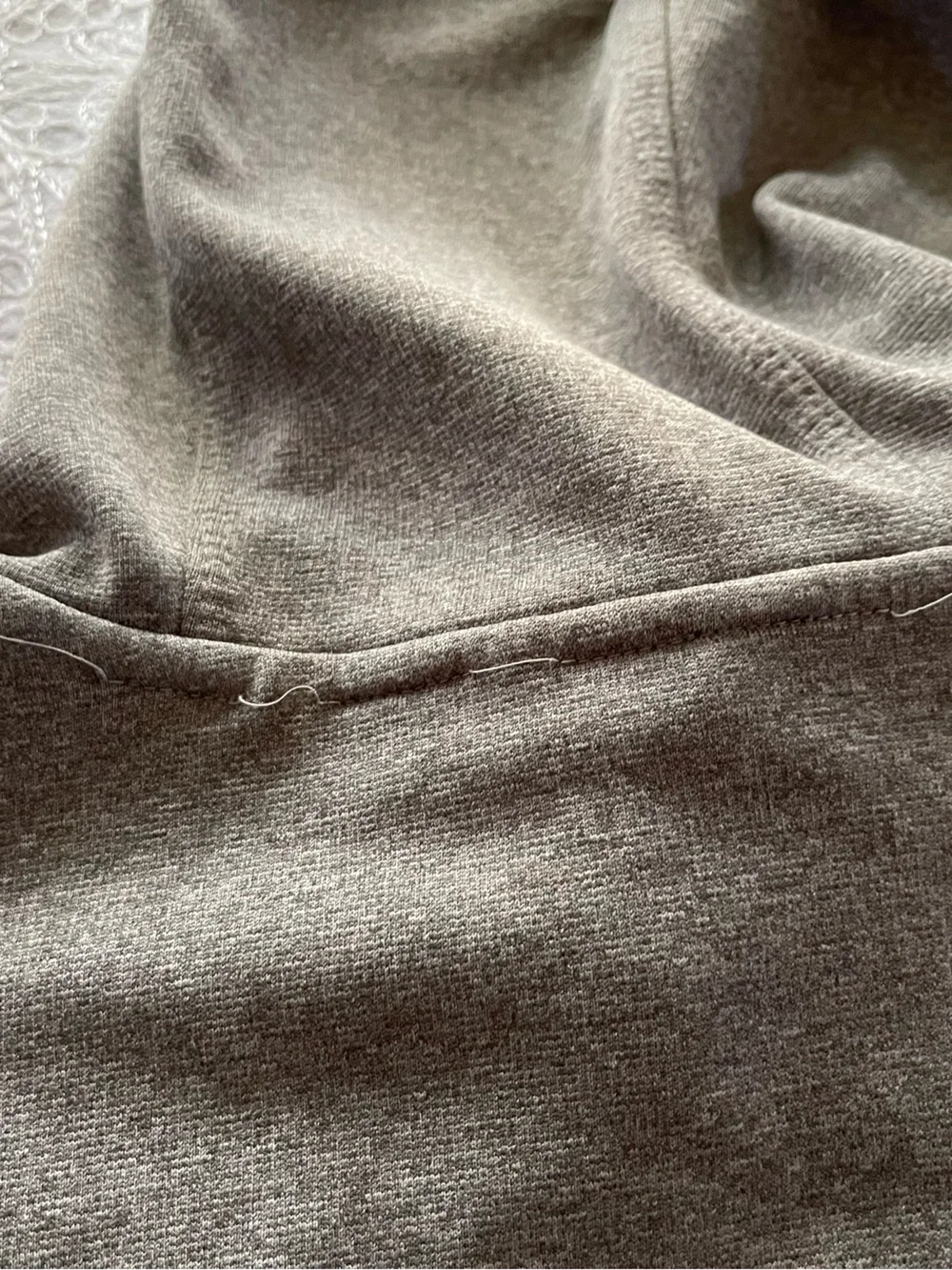The North Face Men's Hooded Lightweight Jacket in Light Gray with Orange Accents